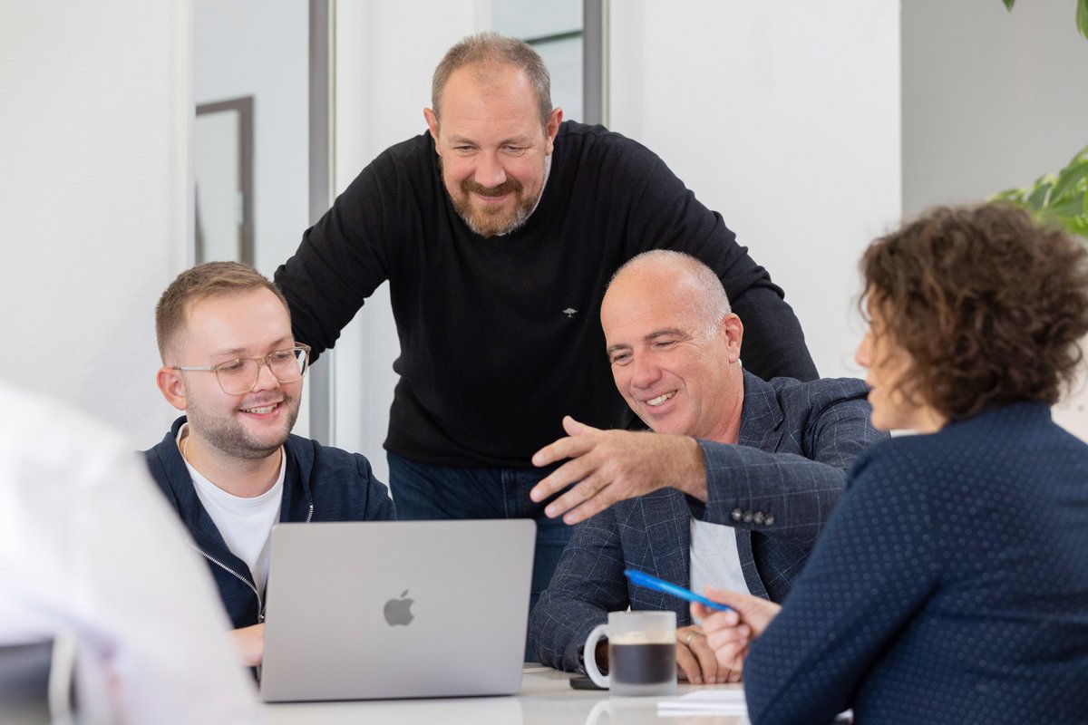 Das Team von arcworx in einem Meeting